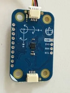 Parte trasera del Modulino Movement con el diagrama de ejes impreso