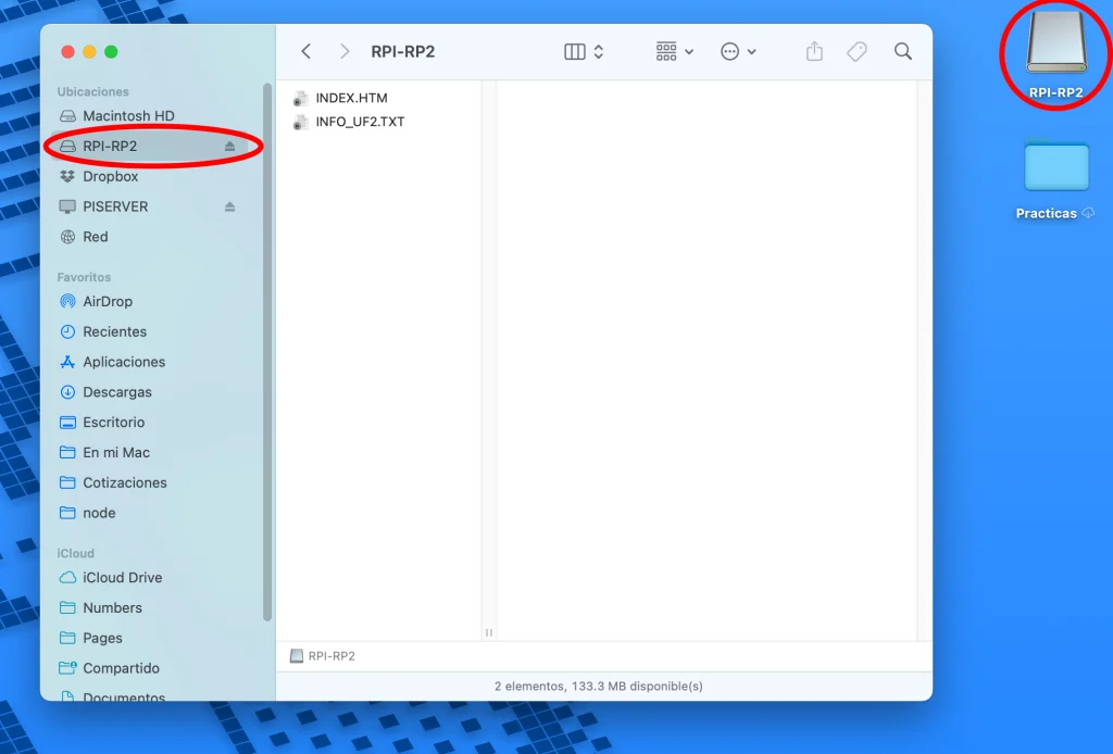 Unidad de almacenamiento masivo de la Raspberry Pi Pico montada en el explorador de archivos, con INDEX.HTM e INFO_UF2.TXT en su interior