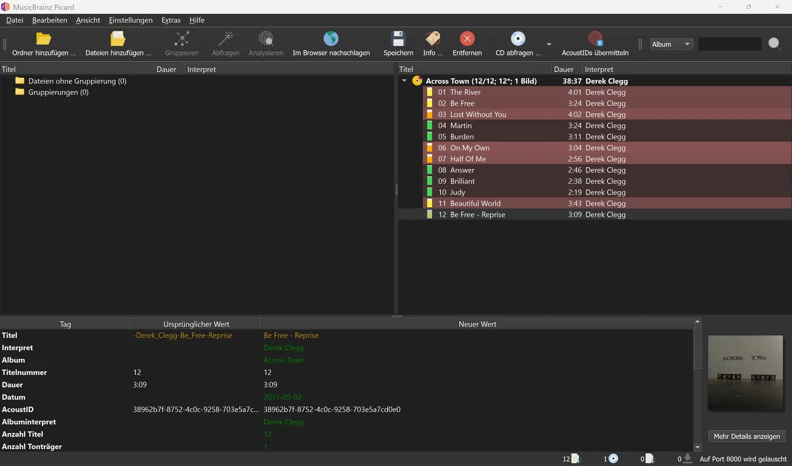 MusicBrainz Picard después de la consulta: el álbum reconocido con sus doce pistas, carátula y tabla de etiquetas antiguas y nuevas