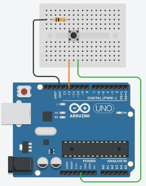 Diagrama de conexión de un pulsador con resistencia pull-down de 10 kΩ a un pin digital del Arduino Uno